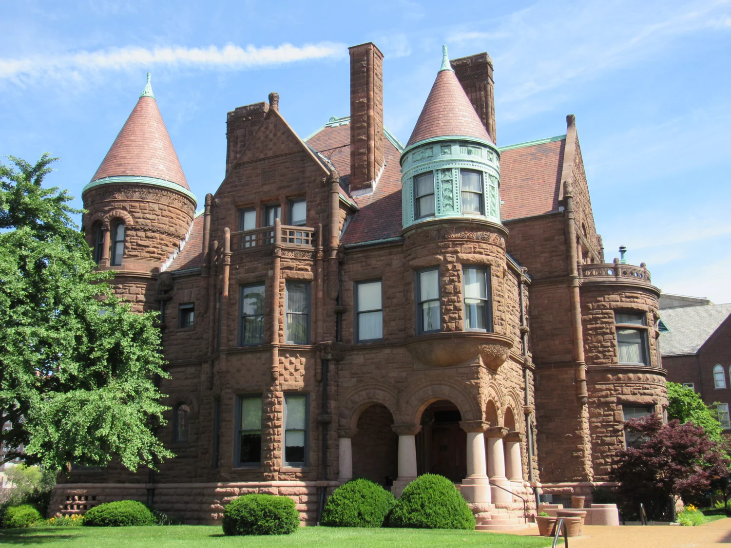 Stone chimneys and carved masonry at the historic Samuel Cupples House in St. Louis